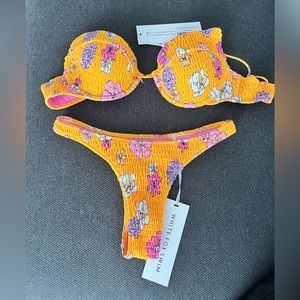Brand new w/tags bikini from Whitefox Boutique.Never worn because top is too big